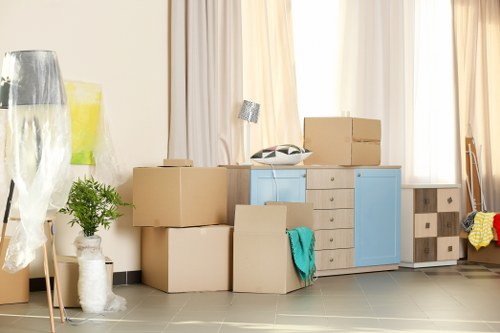 Professional movers handling furniture for a quick local move