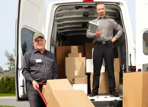Professional house removals planning in Richmond with moving boxes and local streets