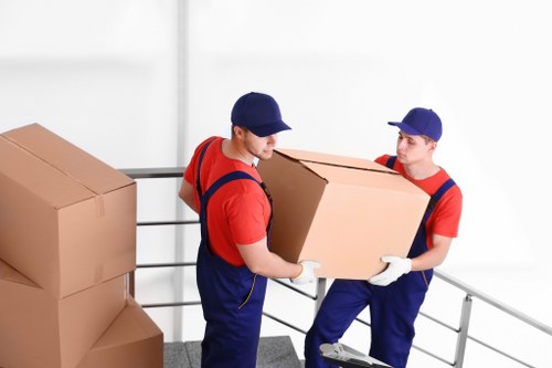 Packed moving boxes and furniture prepared for a Richmond relocation