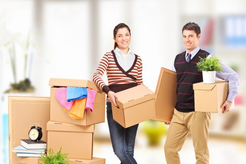 Professional movers handling office equipment in Richmond