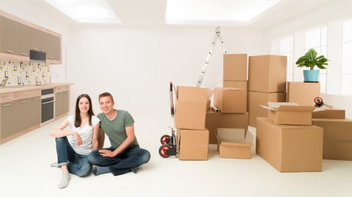 Professional team handling bulky furniture removal in Richmond home