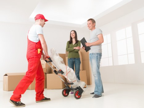 Household furniture pick-up in Richmond with chairs and tables ready for removal