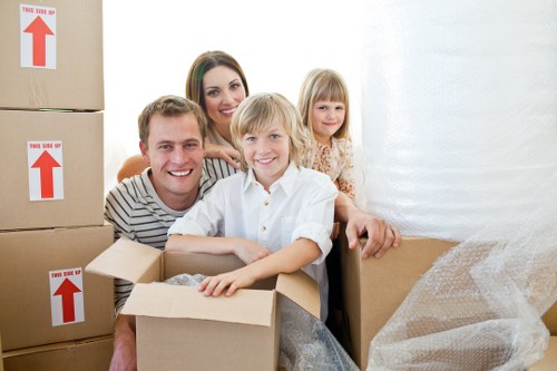 Moving team packing household items for a Richmond relocation