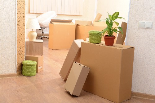 Packed boxes and household items ready for relocation